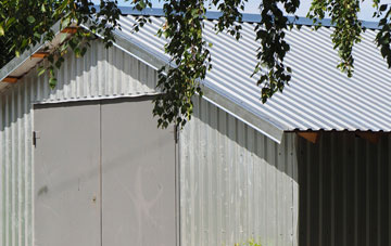 repairing Burras metal garage roofing